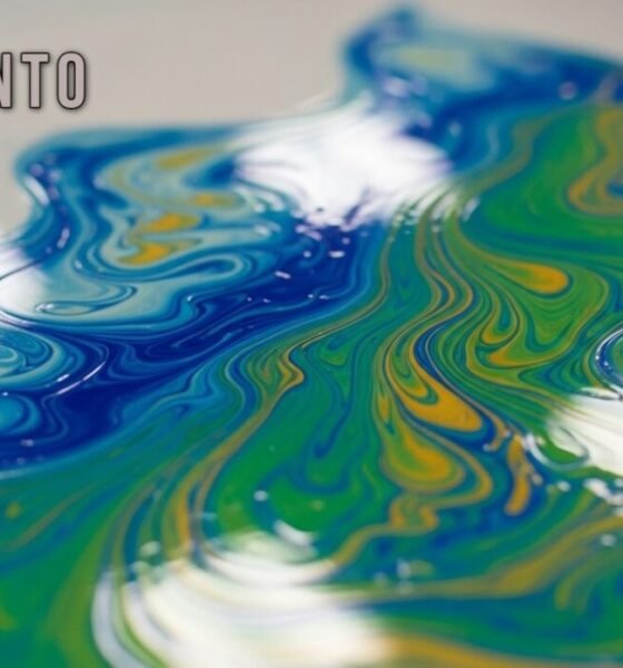 A vibrant artwork showcasing smooth, shiny, and colorful surfaces created using the Acamento process