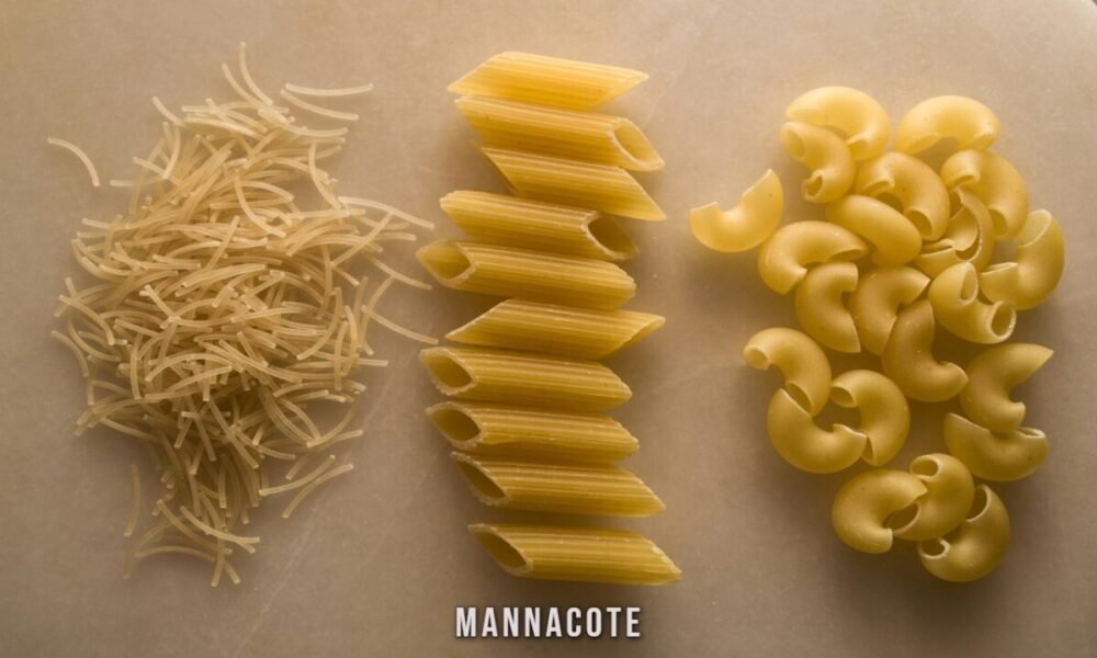 Baked mannacote pasta with cheesy ricotta and spinach filling in a golden casserole