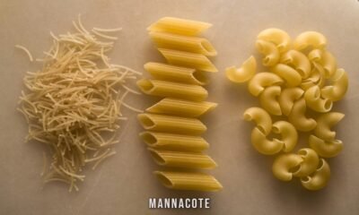 Baked mannacote pasta with cheesy ricotta and spinach filling in a golden casserole