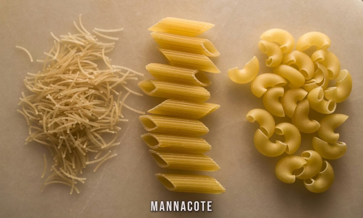 Baked mannacote pasta with cheesy ricotta and spinach filling in a golden casserole